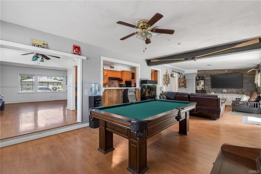 Large family room with a pool table